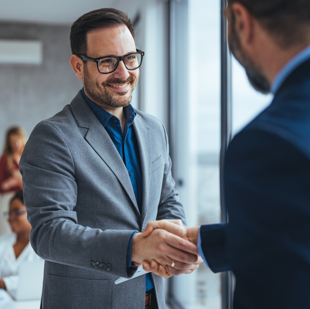 Portrait of cheerful young manager